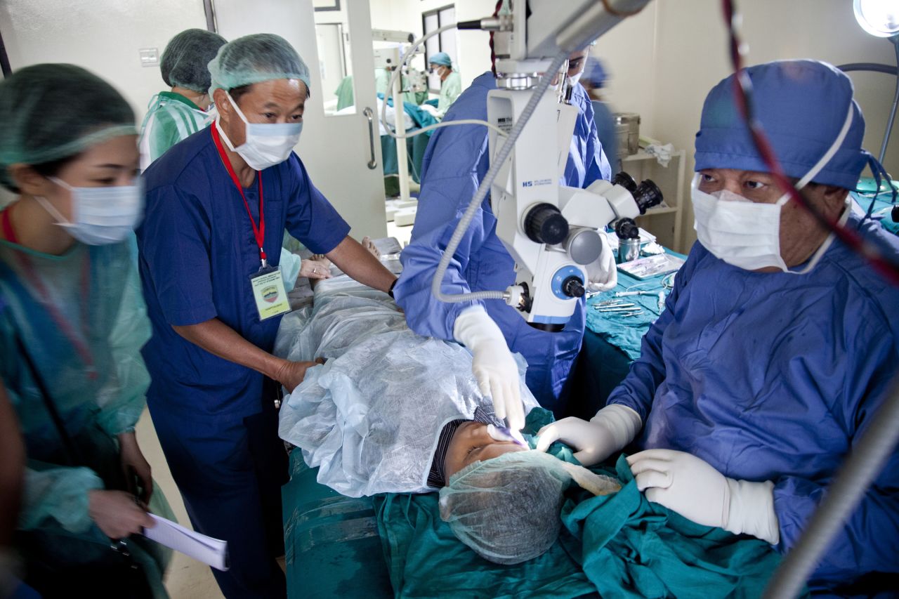 Dr. Sanduk Ruit and his Tilganga Institute of Opthlamology Team performs a surgery on a 9-year-old boy in Nepal in 2011.