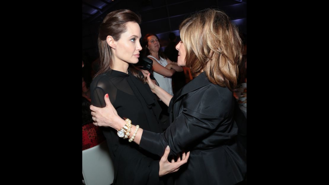 After scathing emails were leaked, Angelina Jolie was photographed awkwardly greeting Sony Pictures chief Amy Pascal.