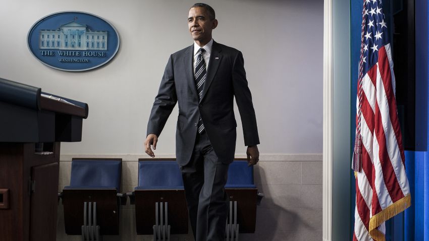 U.S. President Barack Obama arrives to speak to members of the press in the briefing room of the White House on September 27, 2013 in Washington, DC.