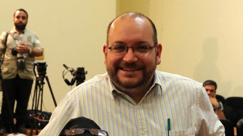 A file picture shows Iranian-American Washington Post correspondent Jason Rezaian and his Iranian wife Yeganeh Salehi posing while covering a press conference at Iran's Foreign Ministry in Tehran, on September 10, 2013. Tehran's chief justice Gholamhossein Esmaili confirmed the arrest of Washington Post correspondent Jason Rezaian and his wife, also a journalist, the official IRNA news agency reported. Rezaian, 38, has been the Post correspondent in Tehran since 2012 and holds both American and Iranian citizenship, according to the newspaper and his wife is an Iranian who has applied for US permanent residency and works as a correspondent for The Nation newspaper based in the United Arab Emirates, the Post said. AFP PHOTO/STRSTR/AFP/Getty Images