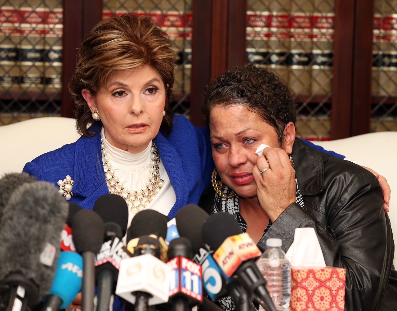 Identifying herself only by a first name during a news conference with lawyer Gloria Allred, Chelan said she was a 17-year-old aspiring model who worked at the Las Vegas Hilton when her father's wife sent pictures of her to Cosby. She said Cosby arranged to meet her at the Vegas Hilton "to introduce me to someone from the Ford modeling agency."  During that meeting, she said, Cosby gave her "a blue pill, which he said was an antihistamine, with a double shot of Amaretto." She alleged that Cosby lay down next to her on the bed and began touching her sexually and grunting.