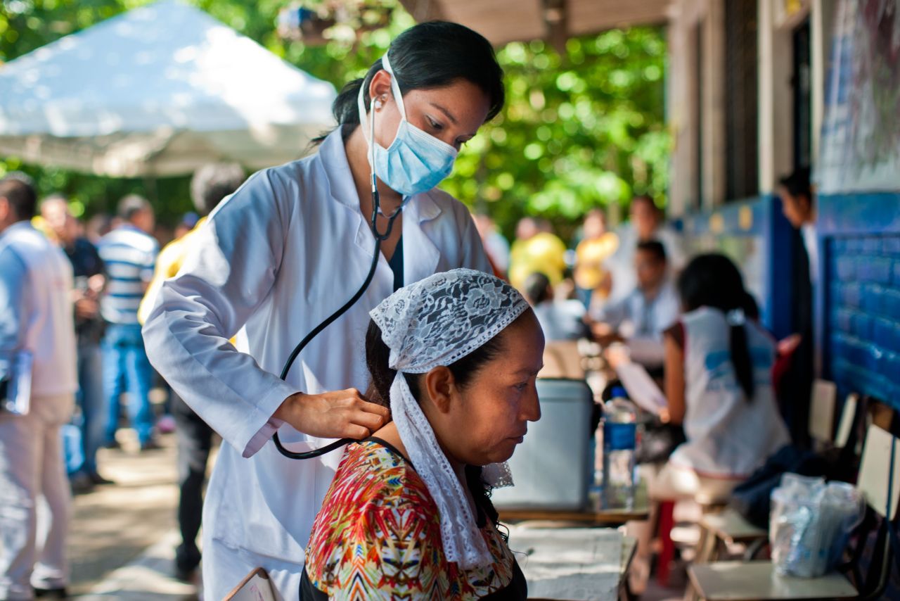 It's a disease with an exotic name, painful symptoms and no treatment or vaccine. It's endemic in Asia and Africa, and it recently spread to the Americas -- where nearly 1 million people have been infected and 150 have died. Here, a doctor examines a patient in El Salvador for signs of Chikungunya.