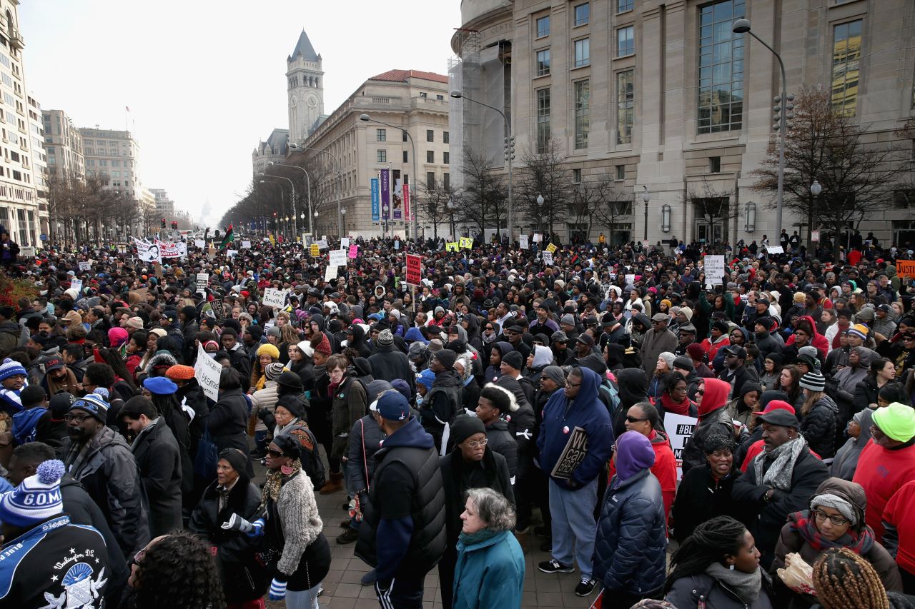 Protesters fill the street as they gather for a march on December 13 in Washington. 