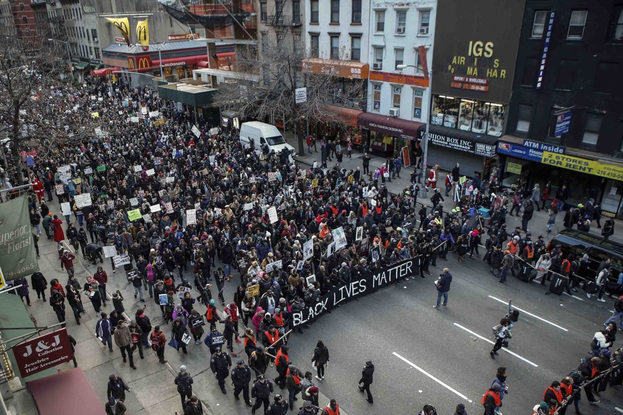 The protest moves down Sixth Avenue in New York on December 13.