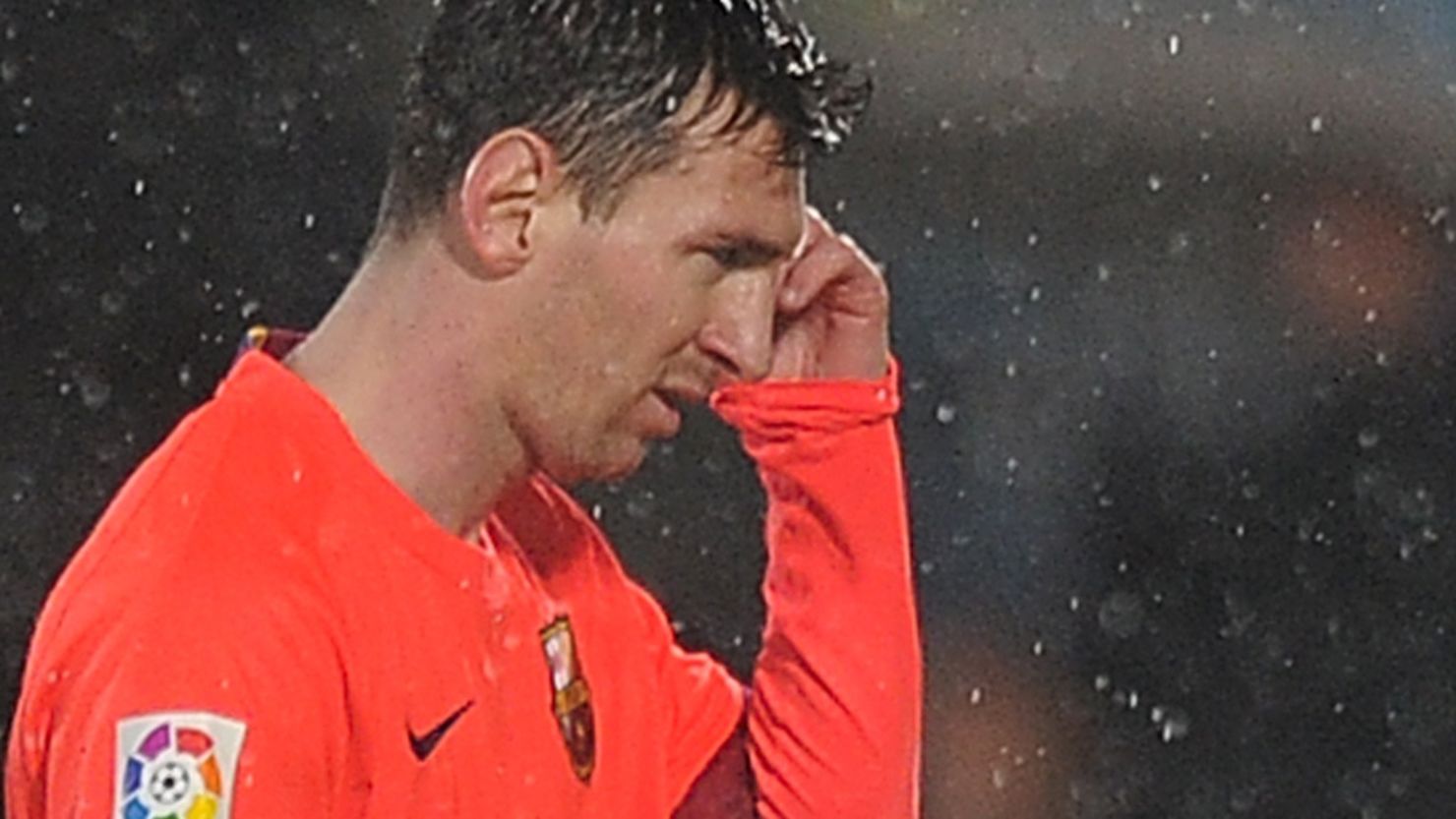 A disconsolate Lionel Messi leaves the pitch after Barcelona was held goalless by Getafe in La Liga.