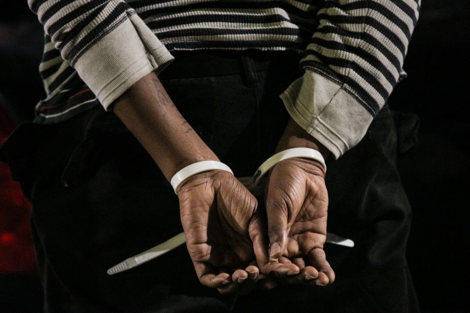 A protester is arrested at a demonstration on December 13 in Oakland.