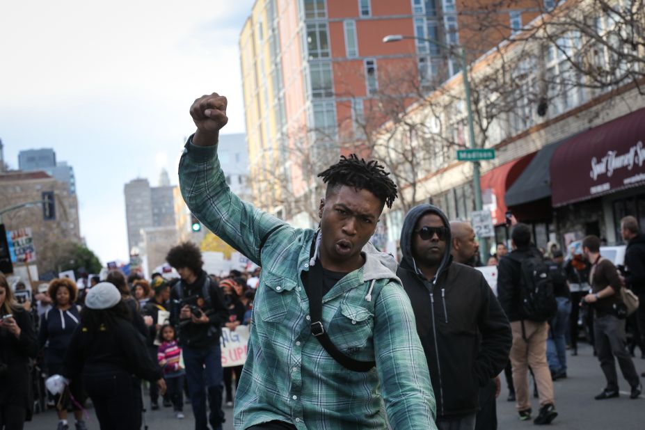 Protesters march through the streets of Oakland on December 13. 