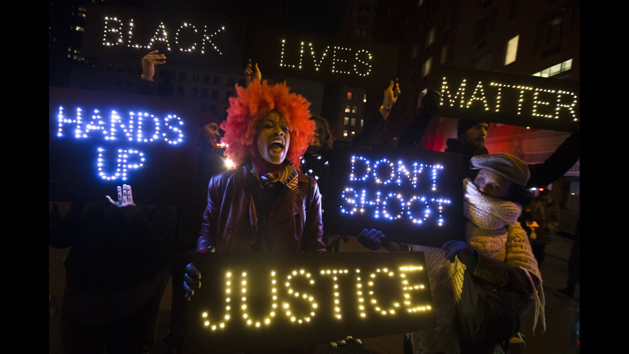 Demonstrators chant during a rally in downtown Manhattan on December 13.