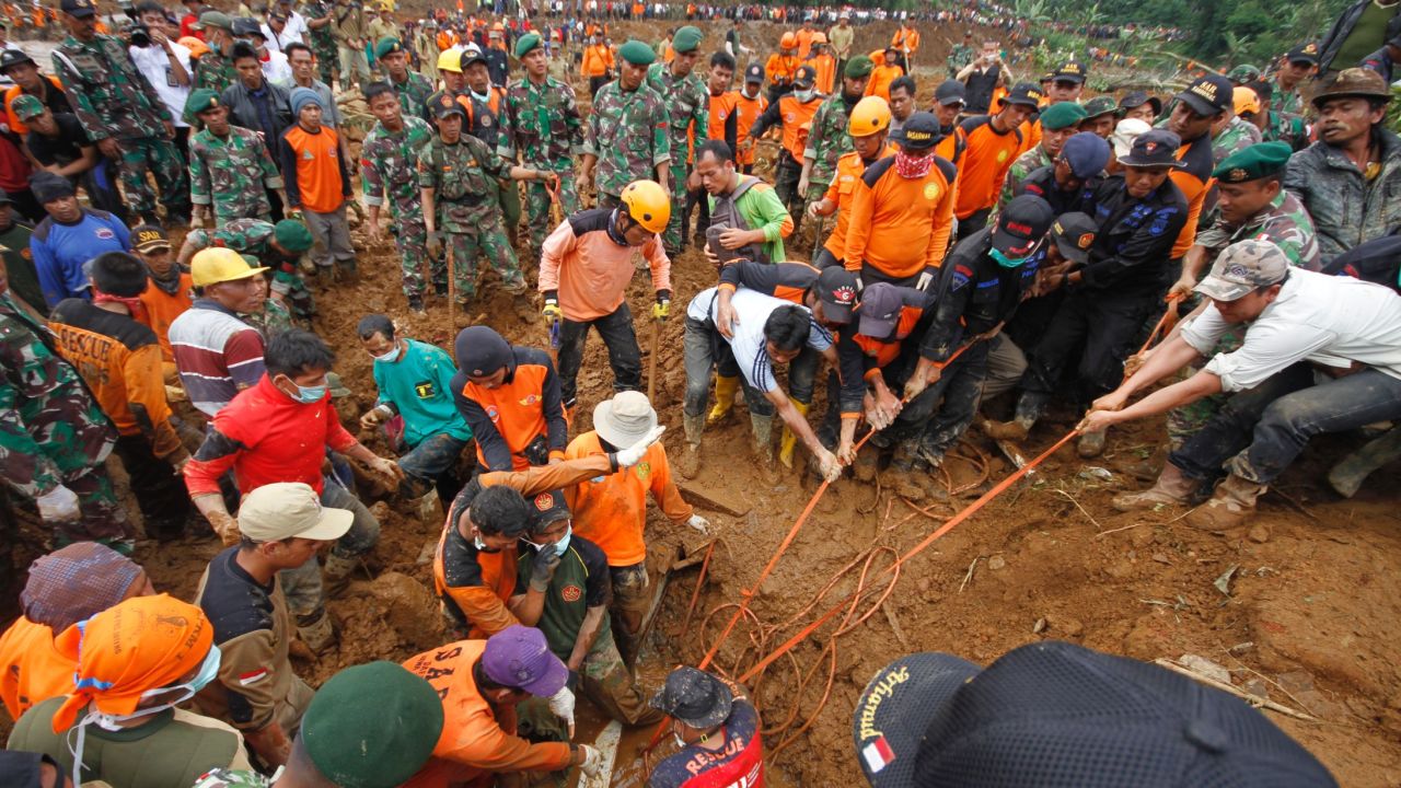Rescue operations under way after a landslide swept away a village in central Java, Indonesia on 14 December, 2014.