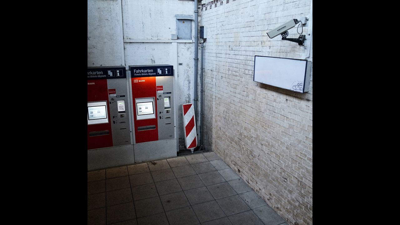 A security camera watches lonely ticket machines at the Hoyerswerda train station.
