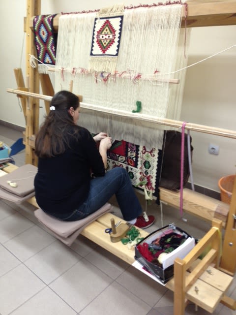 In order to keep the art alive, it is up to new generations to learn and hone the craft. Ceric is schooling her granddaughter in carpet-making. 