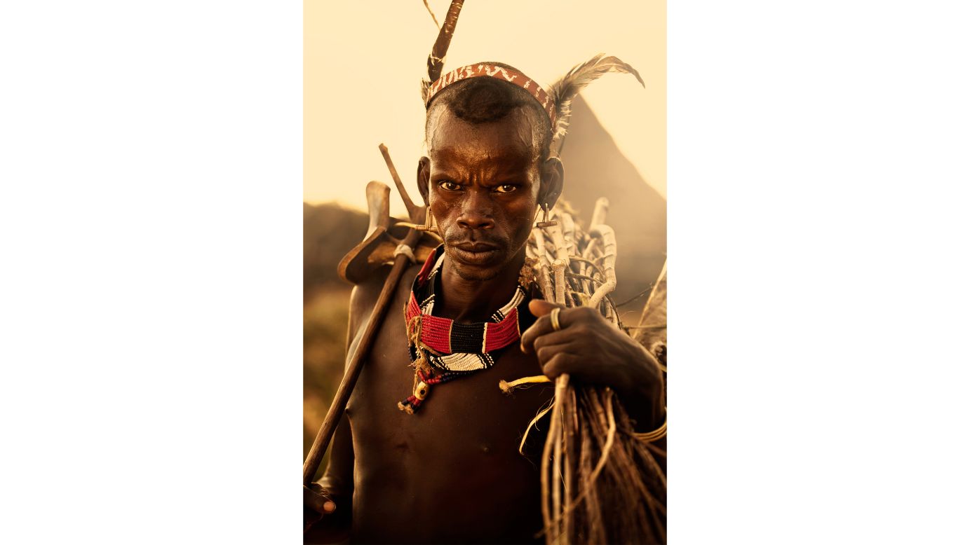 <strong>"Hamer Man," by Diego Arroyo Mendez</strong><br /><br />Spanish photographer Diego Arroyo Mendez's shot from Ethiopia's Lower Omo Valley shows a Hamer tribesman collecting wood to build a fence to enclose cattle.