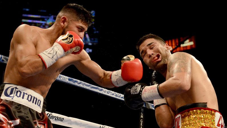 Abner Mares hits Jose Ramirez during their super featherweight bout Saturday, December 13, in Las Vegas. Mares won by a fifth-round stoppage.