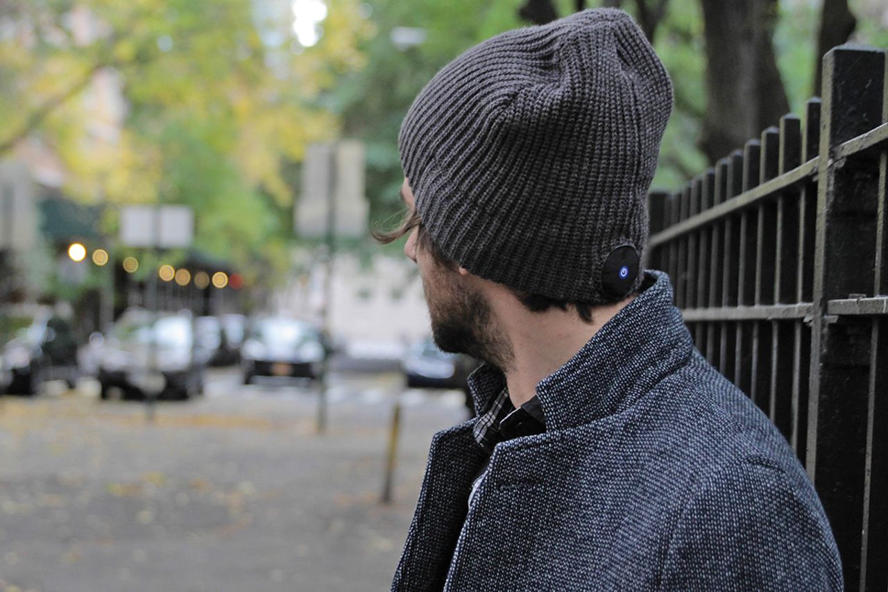 The 1Voice beanie is a warm, wireless way to listen to music. Bluetooth headphones built into the knit hat stream music from your device.