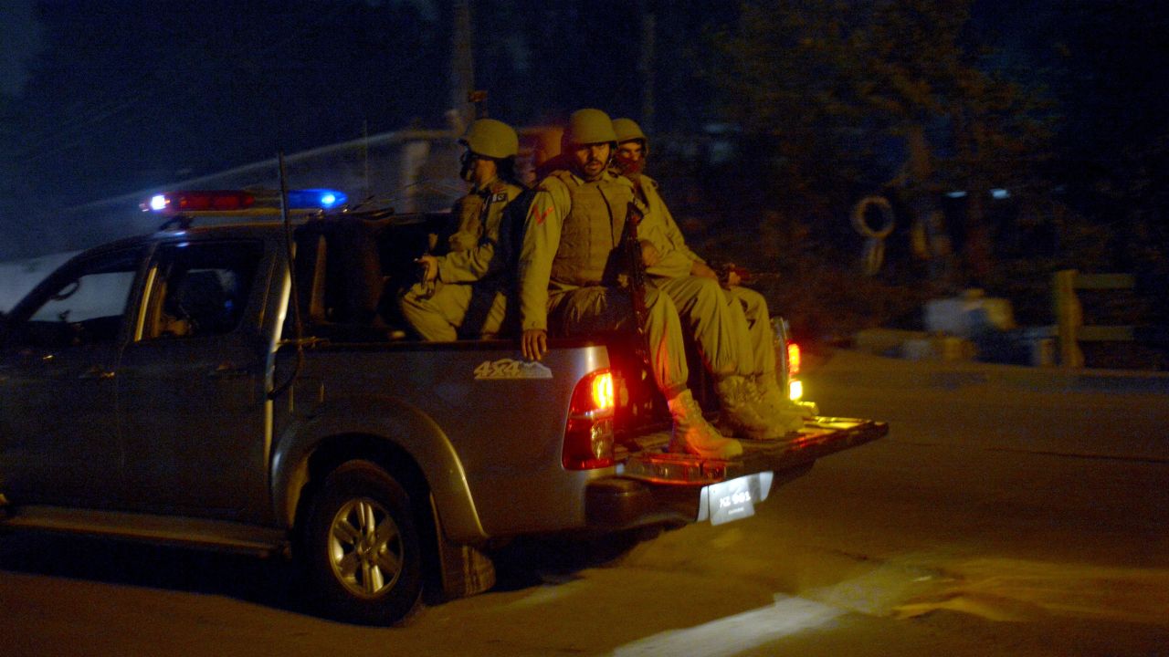 Soldiers patrol the streets in Peshawar, Pakistan, near a school that was attacked by the Pakistani Taliban on Tuesday, December 16. Militants stormed the military-run school in northwest Pakistan, killing more than 140 people, most of them children. More than 100 people were injured.