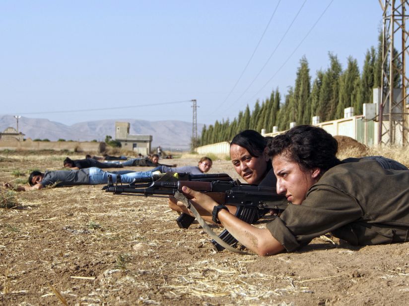 <strong>Kurdish female fighters </strong>-- The young fighters depicted are in training with the Kurdish Women's Defense Units (YPJ). The female fighters have trained for many years but this year have become notable for their courageous role in the war against the Islamic State of Iraq and Syria (ISIS).