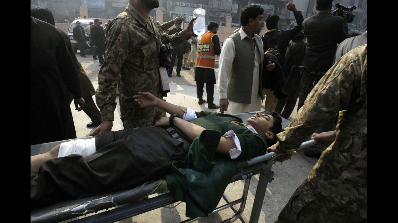 A student is wheeled into a hospital in Peshawar.