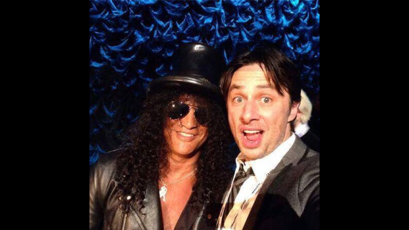 Actor Zach Braff, right, gets a selfie with Guns N' Roses guitarist Slash on Saturday, December 13. "Anyone want in on this budding bromance?" <a href="http://instagram.com/p/wkaPzwP_O5/?modal=true" target="_blank" target="_blank">Braff wrote on his Instagram account.</a>