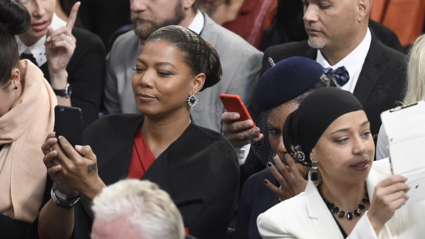 Actress/rapper Queen Latifah takes a selfie with her cell phone as she waits for the start of the Nobel Peace Prize ceremony Wednesday, December 10, in Oslo, Norway.