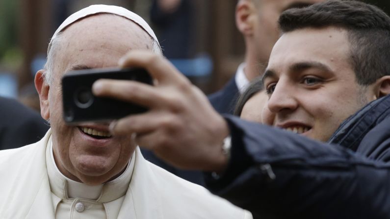 A man in Rome takes a selfie with Pope Francis on Sunday, December 14. <a href="http://www.cnn.com/2014/12/10/living/gallery/look-at-me-selfies-1210/index.html" target="_blank">See 23 selfies from last week</a>
