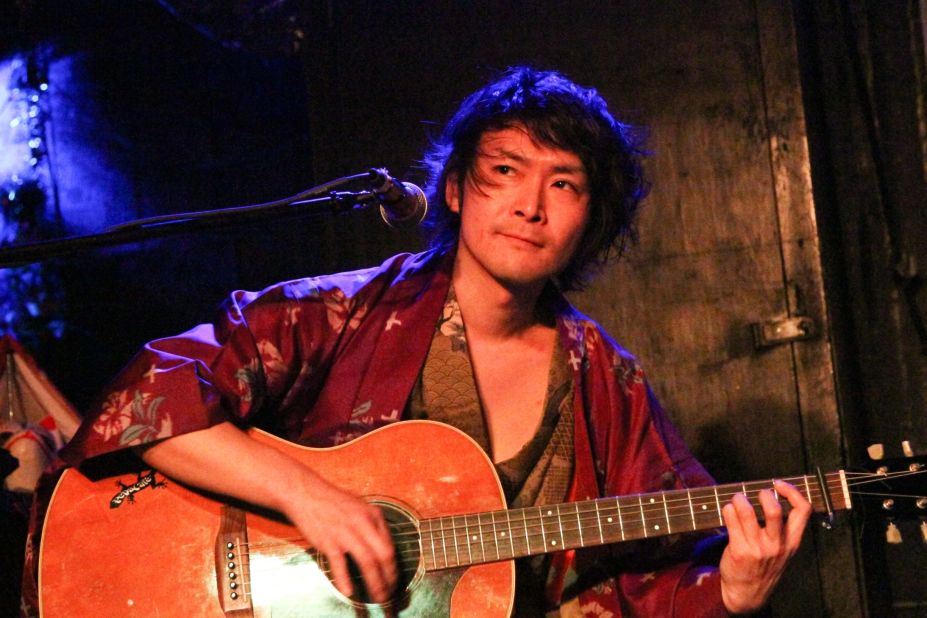 Shuji Yamagiri is the band's leader as well as the principal songwriter and acoustic guitarist. During KAO=S performances, he often sings in a variety of styles, including Japanese folk, shouka, rock and pop. 