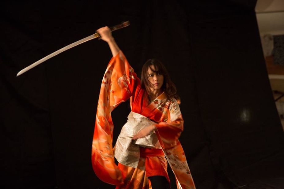 Kaori Kawabuchi is the heart of the band as lead vocalist and sword master. She displays incredible agility and force during her dynamic and intense katana samurai dances and helps the band translate their musical ambitions through the art of movement to a new level.  