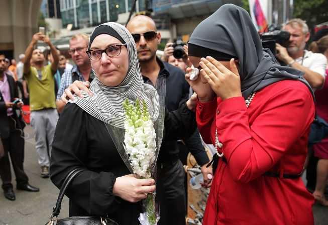 Members of the Muslim community show their respect at Martin Place on December 16.