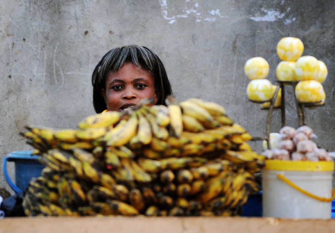 A fruit seller in Ghana sells bananas. West African countries produce nearly all Africa's banana exports and the region accounts for around 4% of the world banana trade.