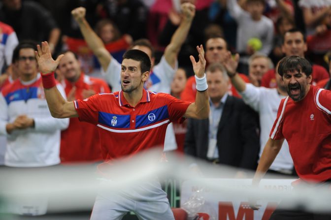 Djokovic celebrates after a historic win against Gael Monfils at the Davis Cup tennis match finals between Serbia and France in December 2010.