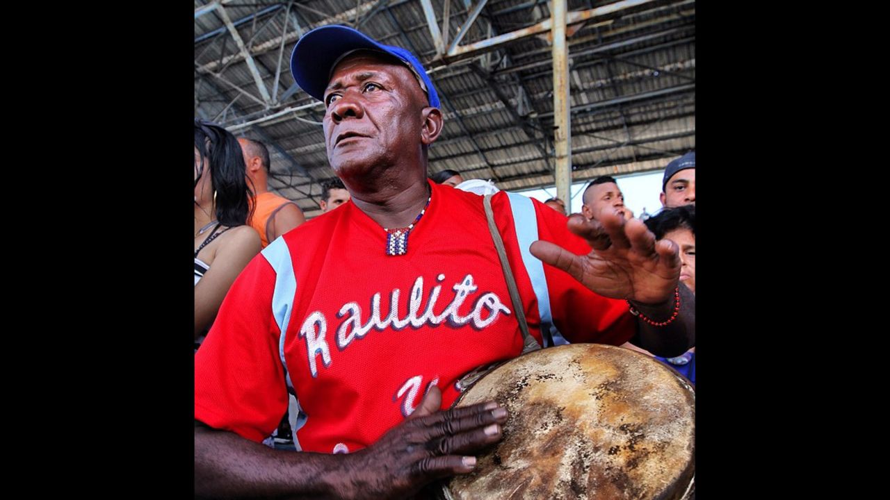A conga player bangs his drum during a Santiago-Havana baseball game. Oppmann says that the drums have fired up ballplayers for generations, but last year the Cuban government tried to ban the congas from baseball. "After an avalanche of criticism, officials relented and the drums will play on," he says.