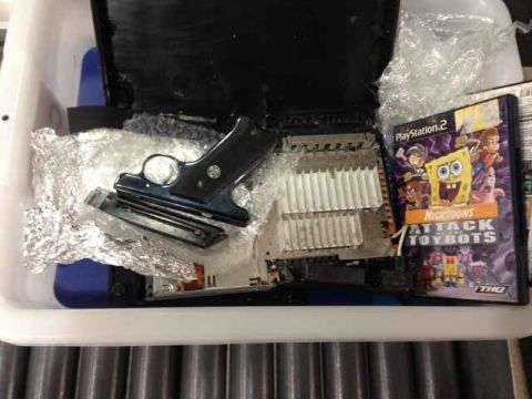 The discovery of parts of a .22-caliber semi-automatic handgun packed in a PlayStation 2 is one of the Transportation Security Administration's latest checkpoint finds. The man who had the gun packed in his carry-on luggage was arrested December 17 on a weapons charge at New York's John F. Kennedy International Airport, the TSA says.