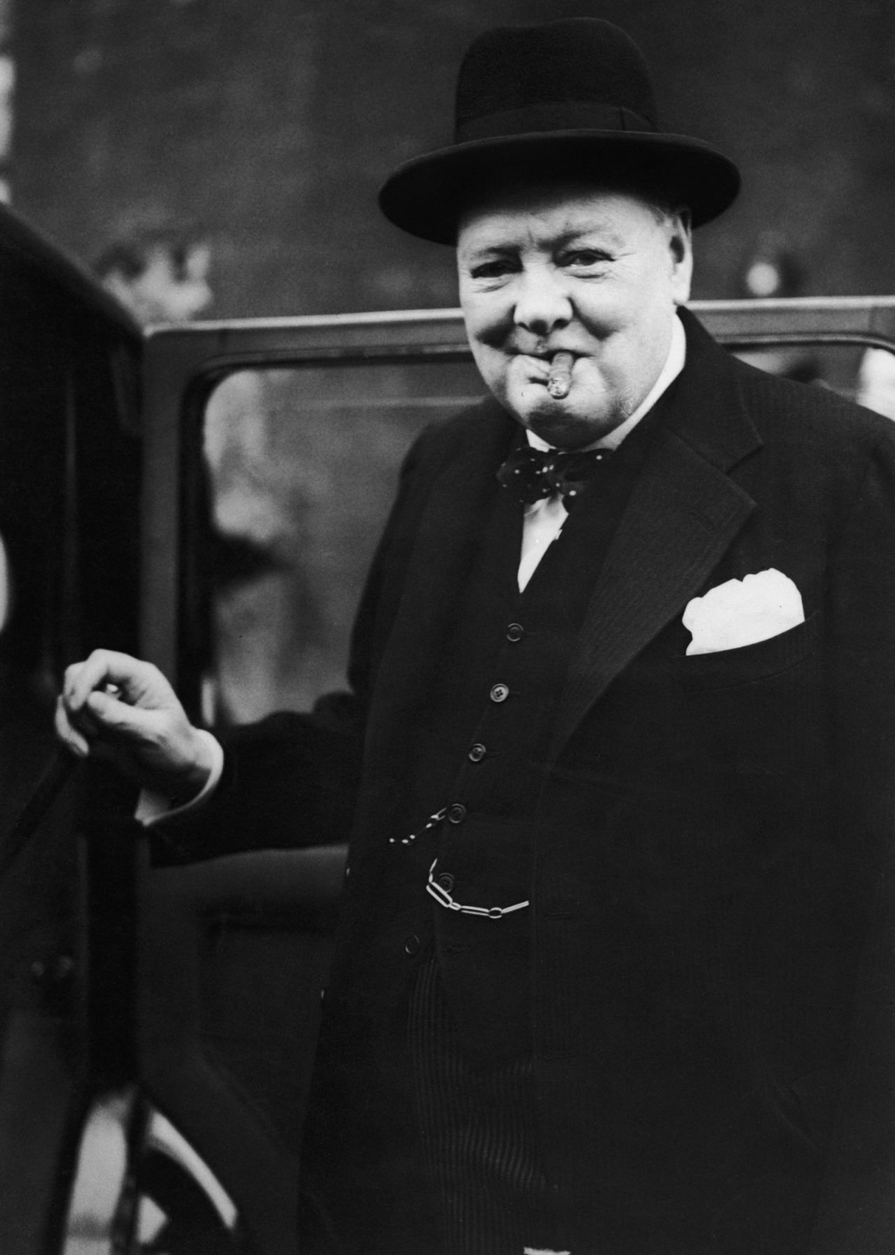 British Prime Minister Winston Churchill on his way to hand in his resignation to King George VI in July 1945. 
