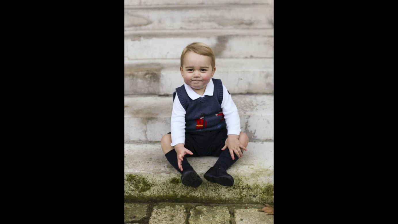 Britain's Prince George sits in a Kensington Palace courtyard in this official Christmas photograph released by his parents, the Duke and Duchess of Cambridge, on Saturday, December 13. <a href="http://www.cnn.com/2014/12/13/world/gallery/prince-george/index.html" target="_blank">See more photos of the young prince</a>
