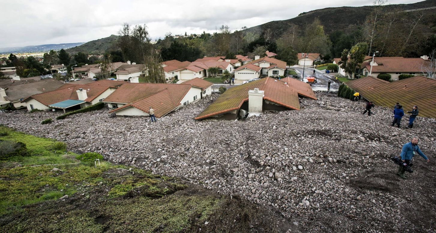 Debris and rocks fill the backyards of homes in Camarillo Springs, California, on Friday, December 12. Ten homes were damaged and ruled uninhabitable after <a href="http://www.cnn.com/2014/12/12/us/weather/index.html" target="_blank">a mudslide crashed into the subdivision</a> and piled rocks almost as high as roof lines, authorities said.
