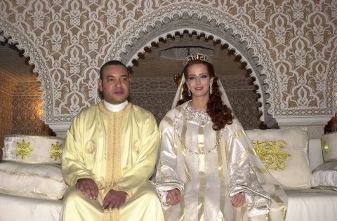 King Mohammed VI of Morocco sits with his wife, Princess Lalla Salma, at the royal palace on July 13, 2002, in Rabat, Morocco. 