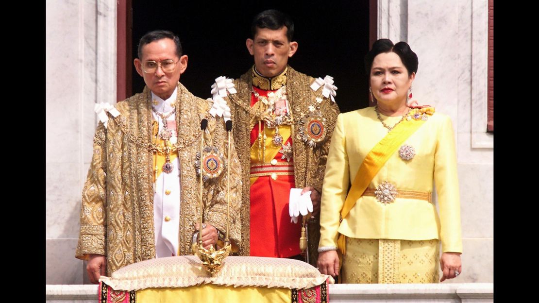 The Thai royal family,  (L to R) King Bhumibol Adulyadej,left, Crown Prince Maha Vajiralongkorn, center, and Queen Sirikit in 1999.