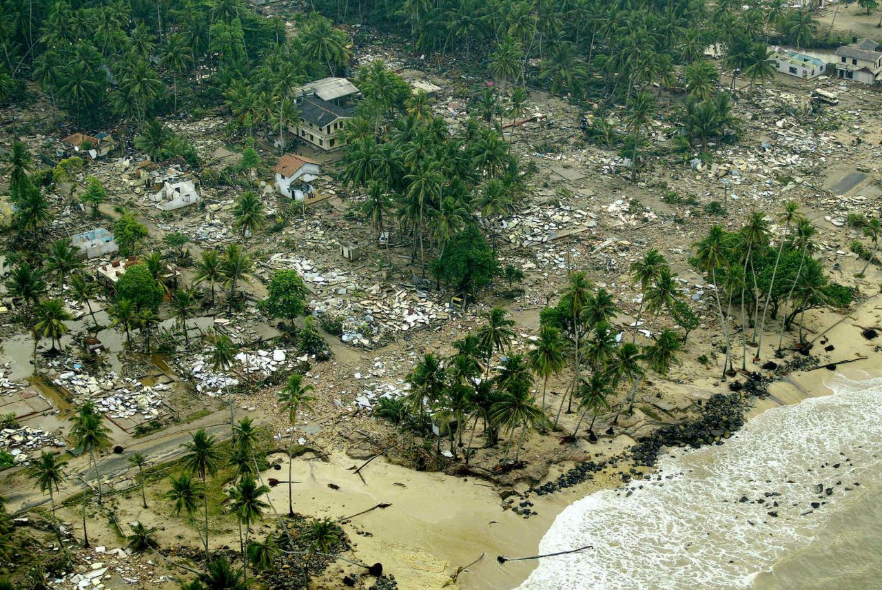 An aerial shot taken from a helicopter shows debris of houses destroyed by the tsunami waves in Galle, Sri Lanka, on December 27, 2004. 