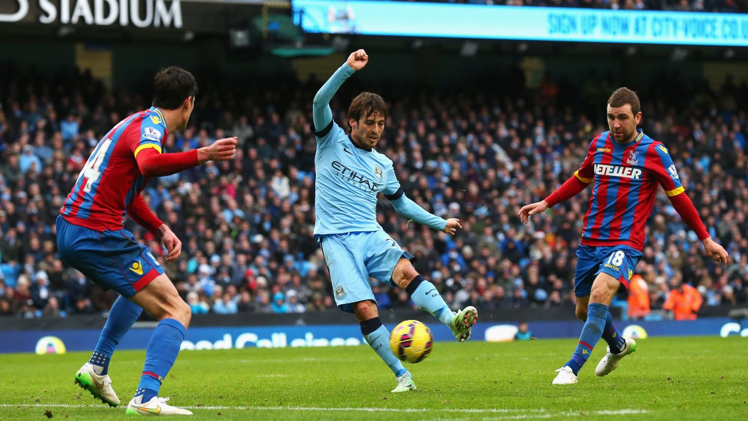 David Silva scored twice for Manchester City to take the defending champions level on points with leaders Chelsea