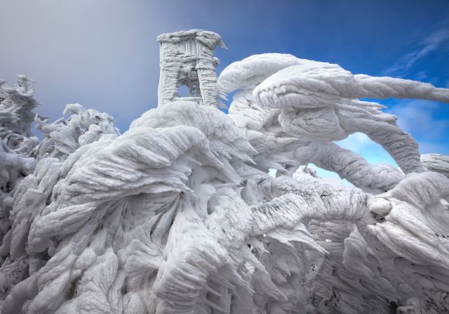 Slovenia's Mount Javornik, a popular skiing spot, was subjected to nine days of strong winds, snow and ice starting on December 1. After the storm passed, photographer <a href="http://www.markokorosec.net/" target="_blank" target="_blank">Marko Korošec</a> went to the summit to photograph the results. What he found was a wonderland of trees, vegetation and structures coated in a hard layer of ice. 