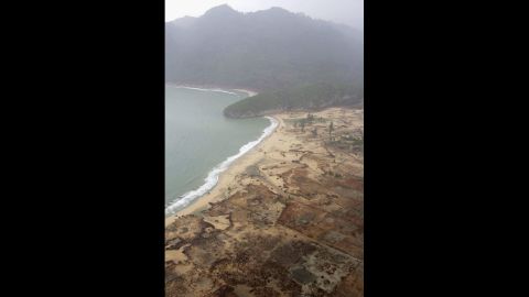 An aerial shot shows devastation caused by the Indian Ocean tsunami to the west of Aceh on January 8, 2005, in Banda Aceh, Indonesia. Indonesia, Thailand and Sri Lanka were the countries most affected by the December 26 earthquake-tsunami. 