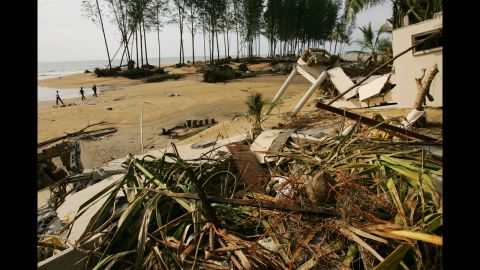 Debris and collapsed buildings are seen on December 29, 2004, at the Theptharo Resort in Khao Lak, where many tourists died when their bungalows were swept away by the tsunami.