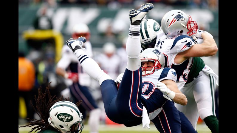New York Jets free safety Calvin Pryor tackles Danny Amendola of the New England Patriots on December 21 in East Rutherford, New Jersey.