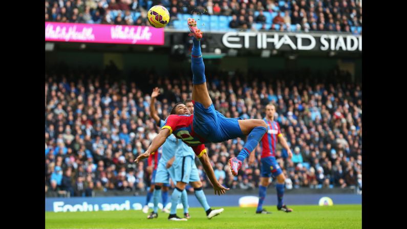 Crystal Palace striker Fraizer Campbell kicks the ball toward the goal during the Barclays Premier League match against Manchester City on December 20, in Manchester, England.
