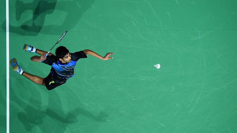 In badminton, Kidambi Srikanth of India hits the birdie back to Kento Momota of Japan in the men's singles during day one of the BWF Destination Dubai World Superseries Finals on December 17 in Dubai.