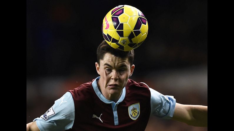 Burnley's Michael Keane heads the ball during their English Premier League soccer match against Tottenham Hotspur at White Hart Lane in London on December 20.