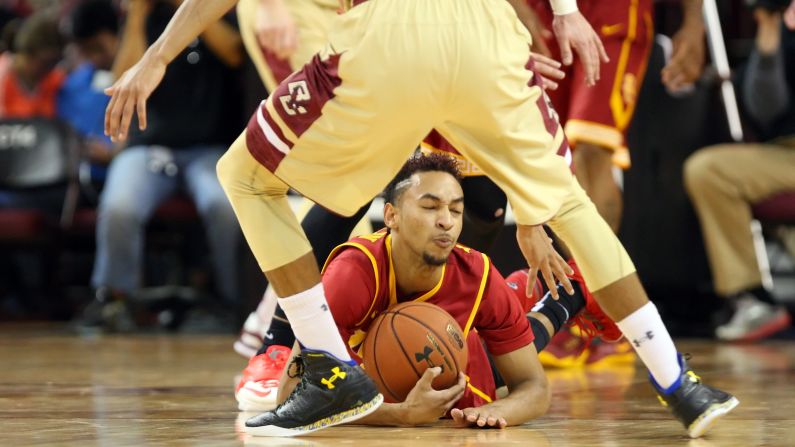 University of Southern California Trojans guard Jordan McLaughlin dives for the ball during the first half of an NCAA basketball game against Boston College Eagles at Conte Forum in Chestnut Hill, Massachusetts, on December 21.