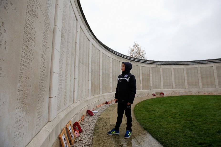 One of the young players takes time to read the names on the Menin Gate at Ypres. Clubs from 10 European countries took their teams to the tournament where they learned about the history of the First World War.