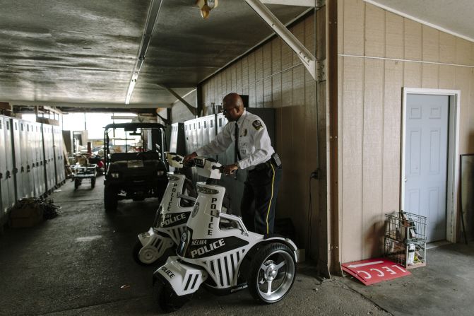 Riley tests the battery on a mobile command unit in the parking garage at the Selma Police Department. Riley describes himself as forward thinking but acknowledges that the past, at times, weighs heavy in Selma.