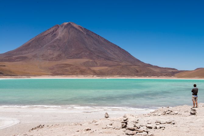 The product of arsenic and other minerals, Laguna Verde's green hue changes from turquoise to dark emerald as winds shift sediments. 