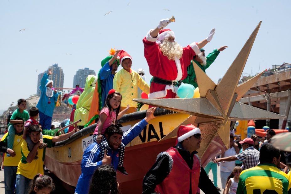 A fisherman in Santa disguise joins in the holiday celebrations  in Valparaiso, Chile.